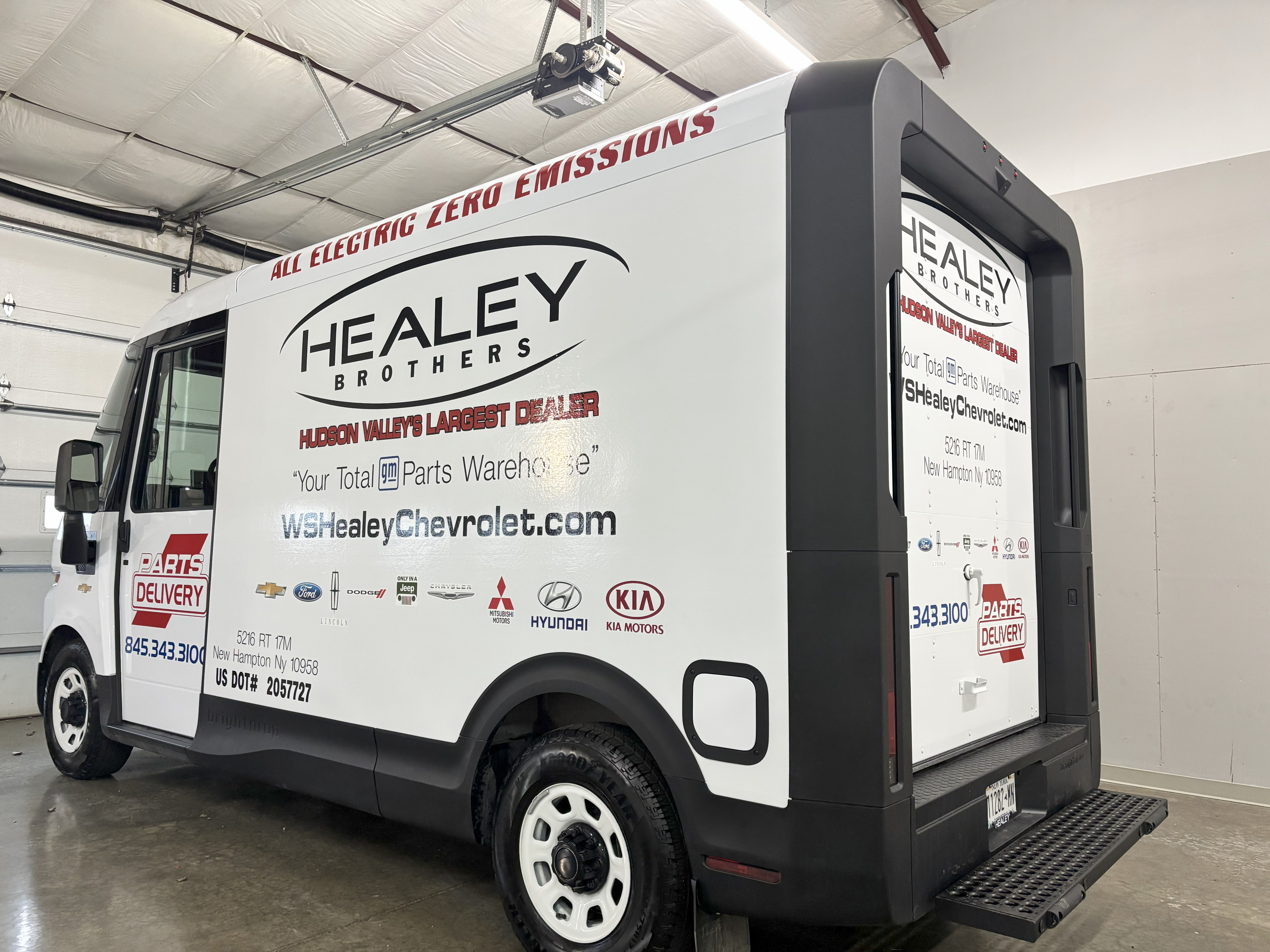 Commercial vehicle graphics on a branded parts truck